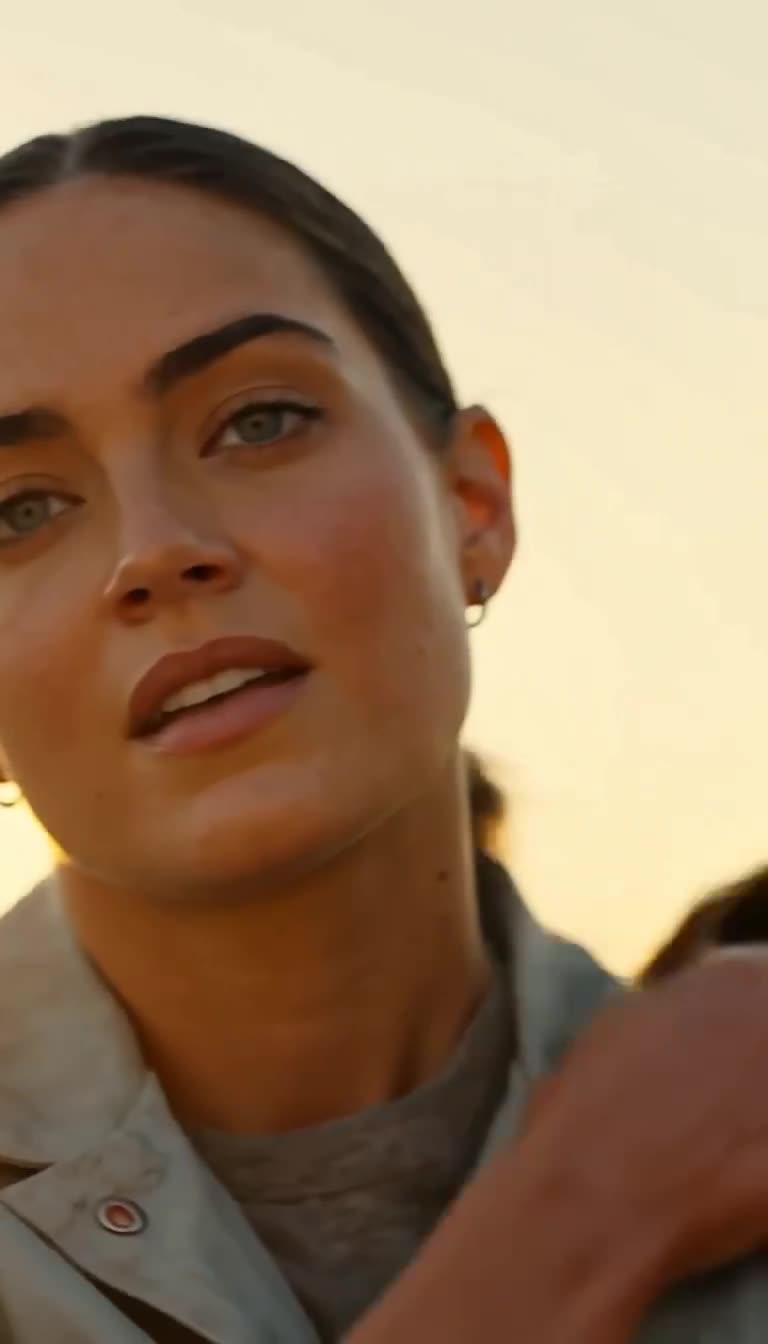 Close-up of Specialist Sarah Martinez delivering her composed response in golden sunlight