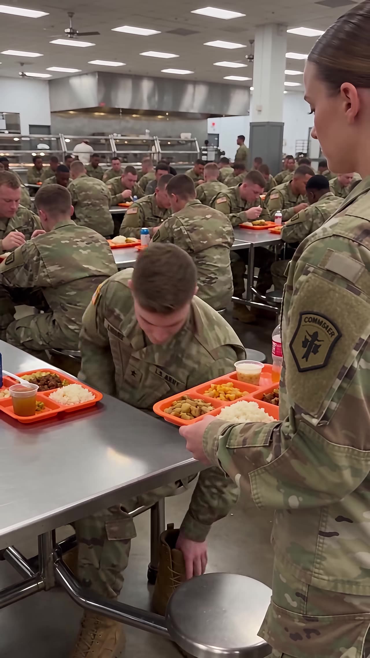 Shocked soldier removes boots after Commander rank reveal