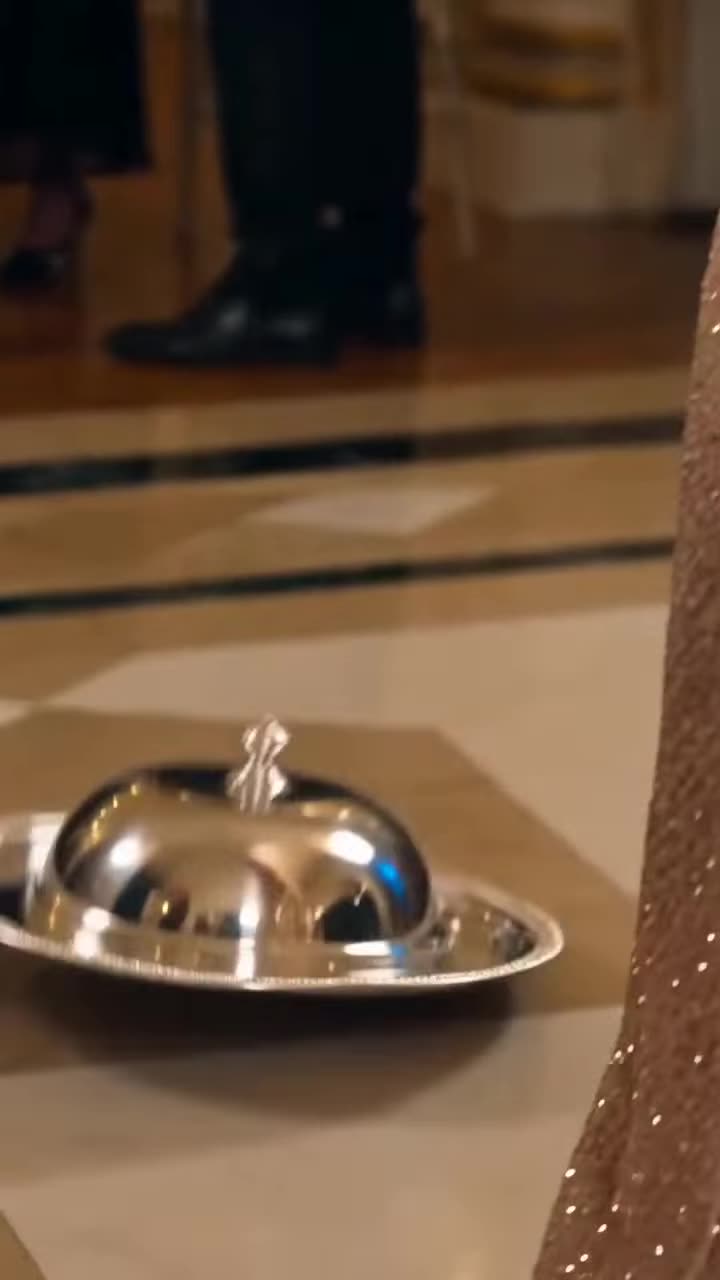 Silver serving tray dropped on ballroom floor