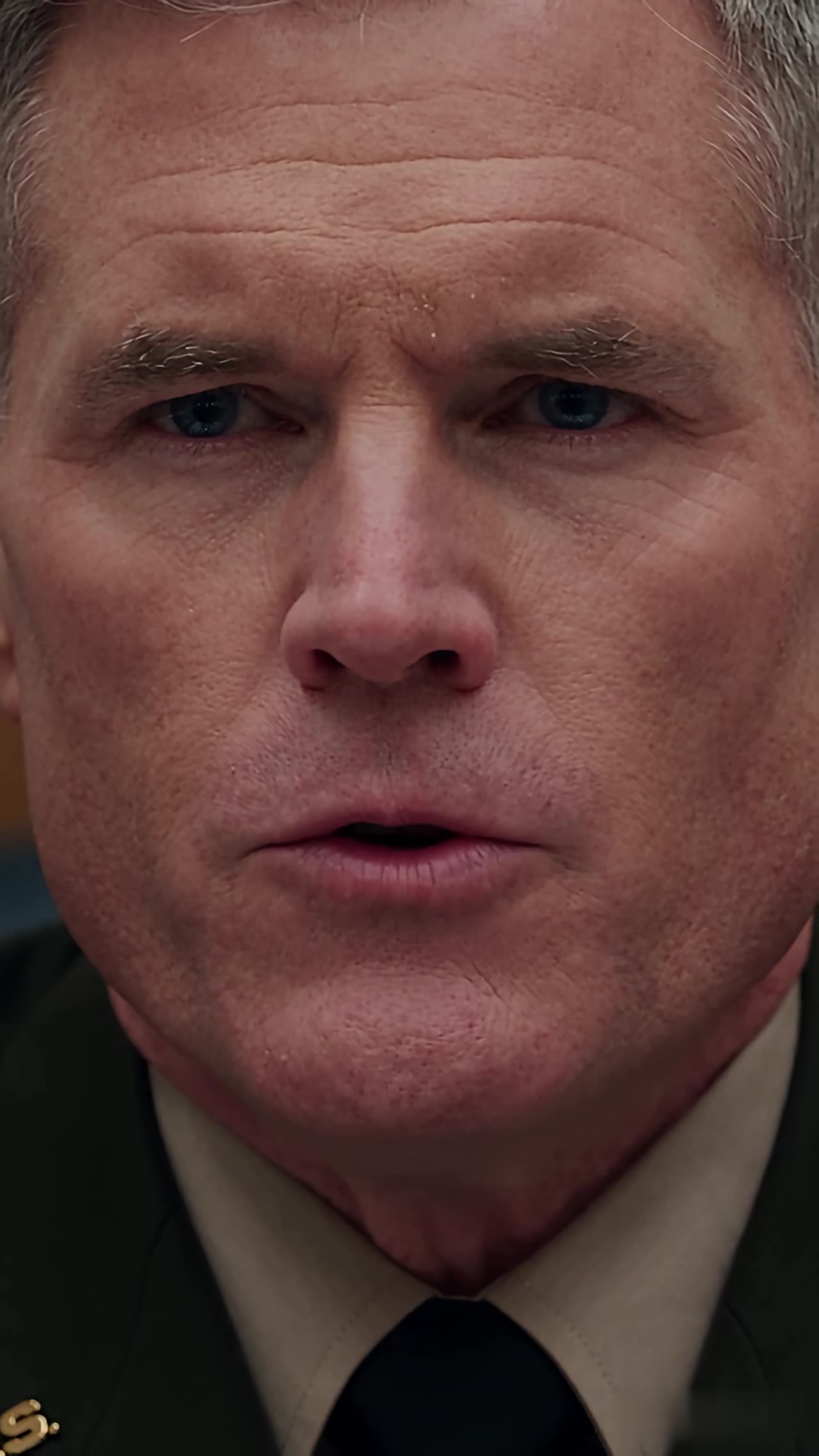 Extreme close-up of general's stunned face